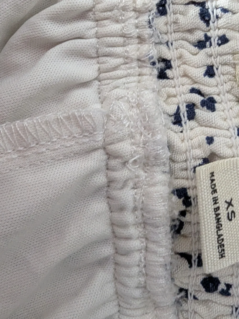 Tiered Ruffle Mini Skort in White with Navy Floral Print
